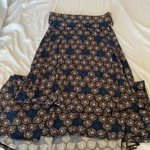 Lularoe woman’s navy with gold details stretchy maxi skirt size xxs